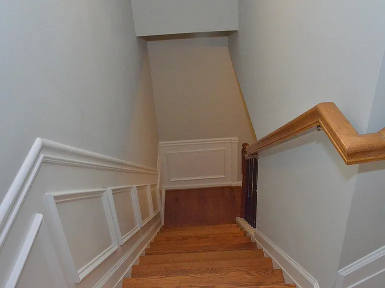 Stairs for accessing Garage, Guest bedroom and Laundry