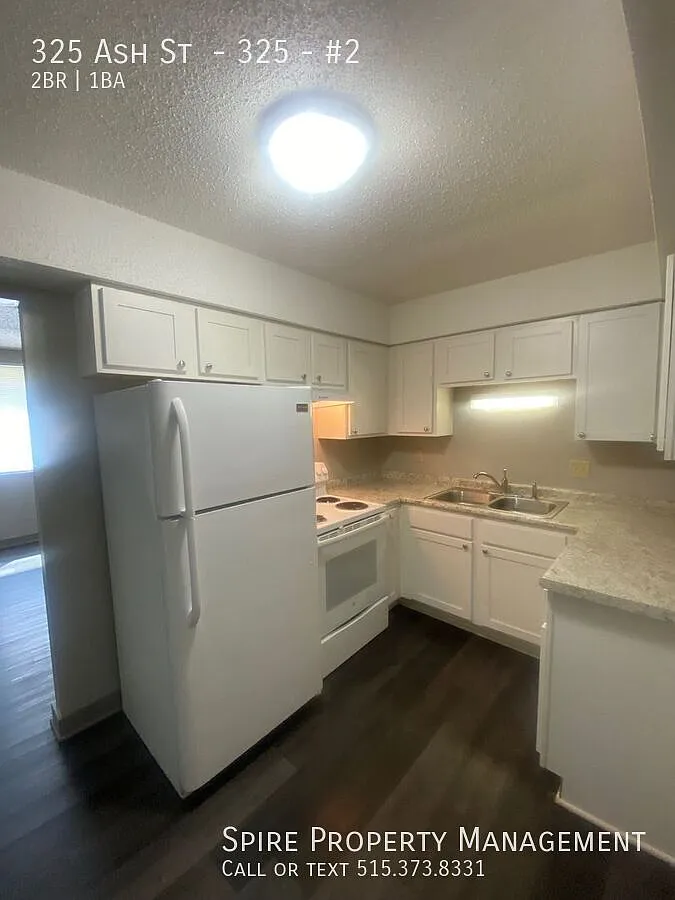 Gorgeous hard-surface floors in a first floor unit! — Photo 1