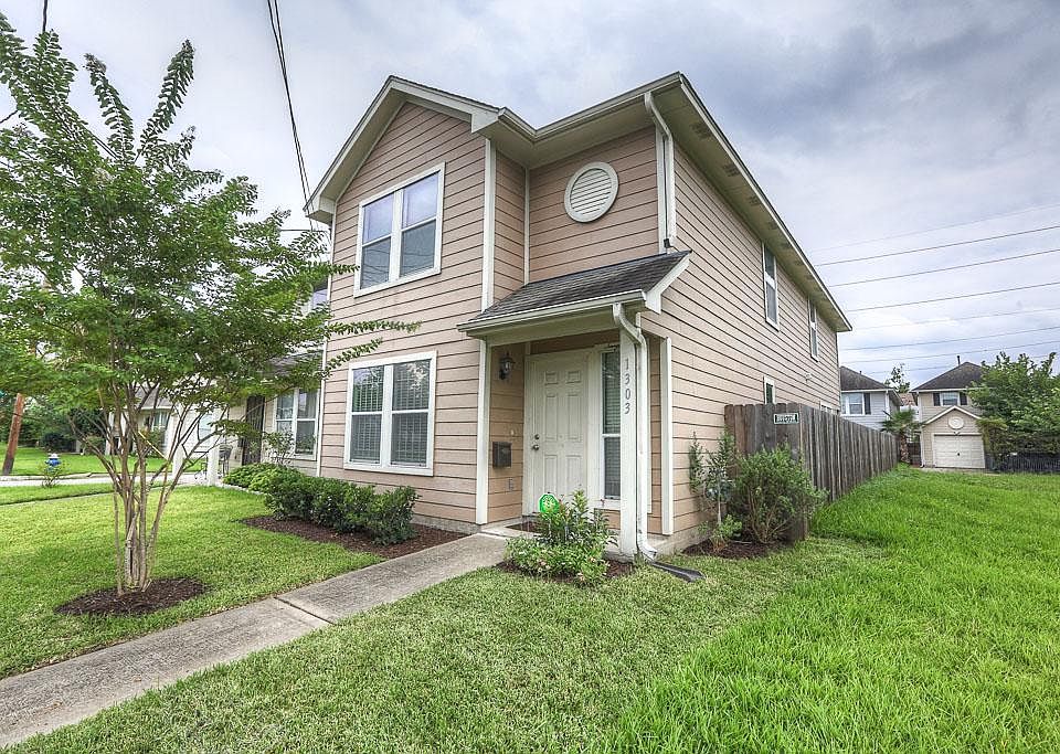 Welcome to 1303 Ruthven in Midtown - 3 bedroom, 2.5 bath freestanding home with garage.