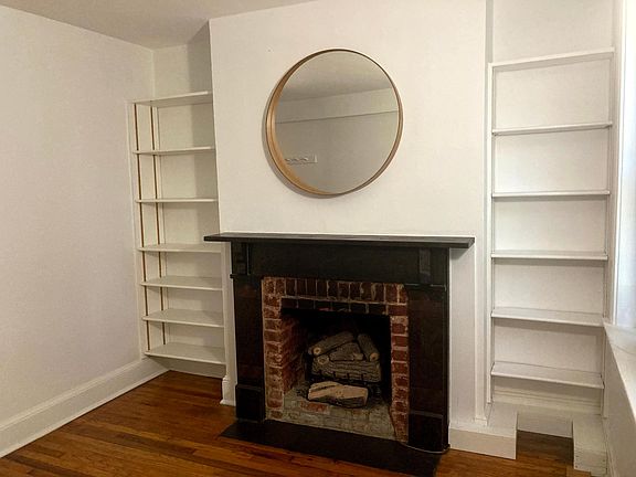 Gas fireplace and built in shelves.