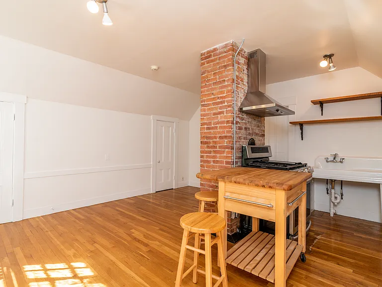 kitchen with counter and stools