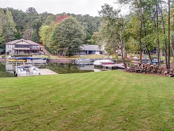 Image 4: Fantastic Level Yard Leads to Dock