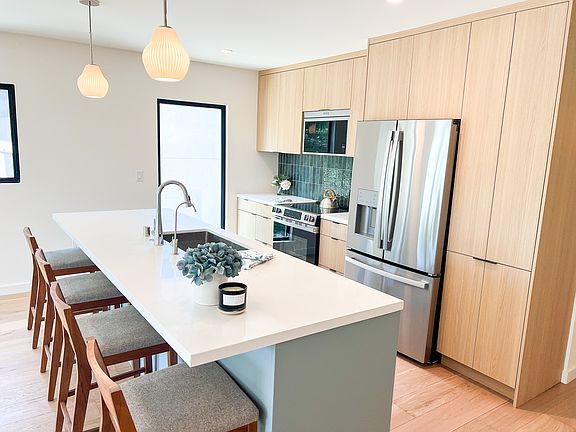 Kitchen with all new stainless steel appliances