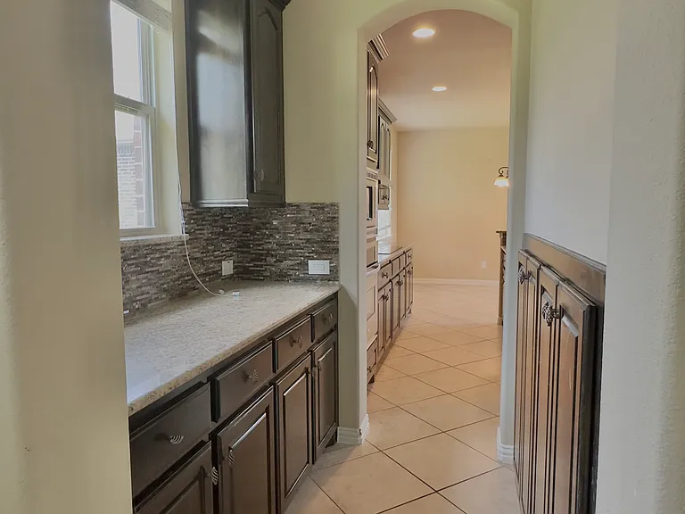 Hallway between the kitchen and formal dining