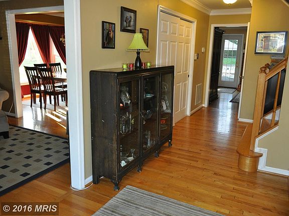 Welcoming Foyer features warm hardwoods