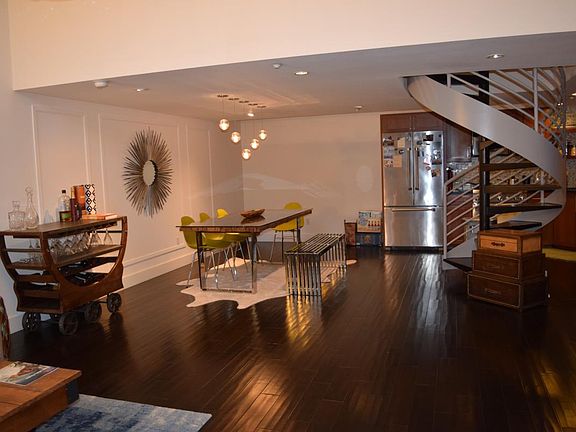 Beautiful dinning area with table and lighting