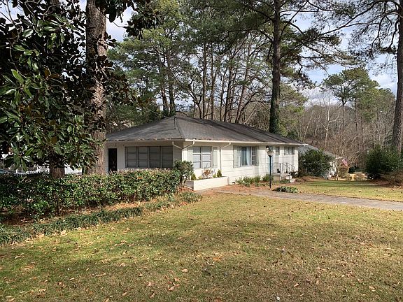 Front of house with driveway off Lindbergh