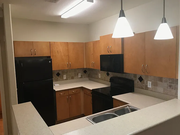 8290 Gate Pkwy W #316 — Photo 1