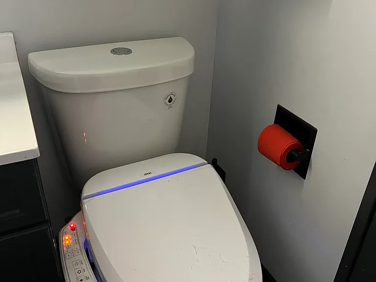 Heated seat and warm bidet water