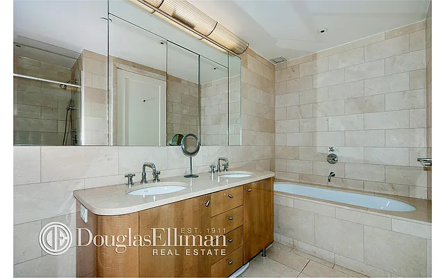 Sold by Douglas Elliman | media 18