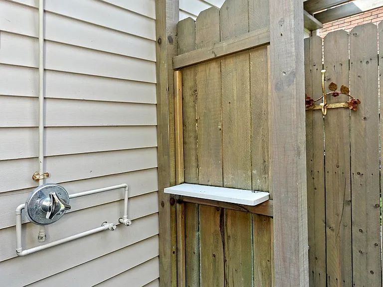 Outdoor shower and changing area.