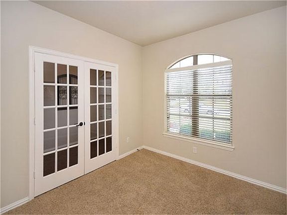 Spacious home office which could be a fourth bedroom.