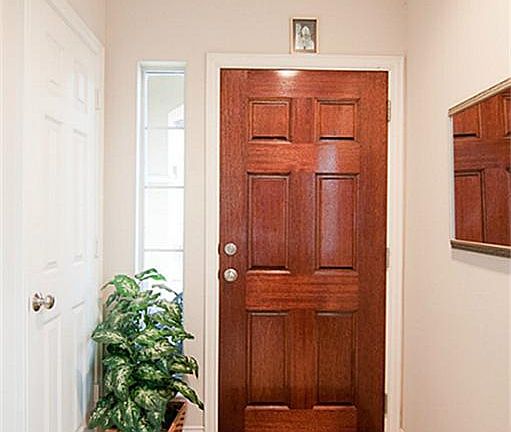 inside tiled front entry between 1st & 2nd floor