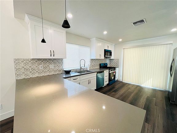 4th image of 9010 Wilbur Ave