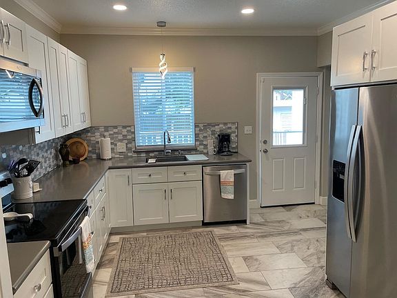 Well appointed kitchen with stainless appliances
