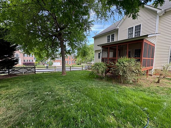 Fenced Backyard and Screened Porch