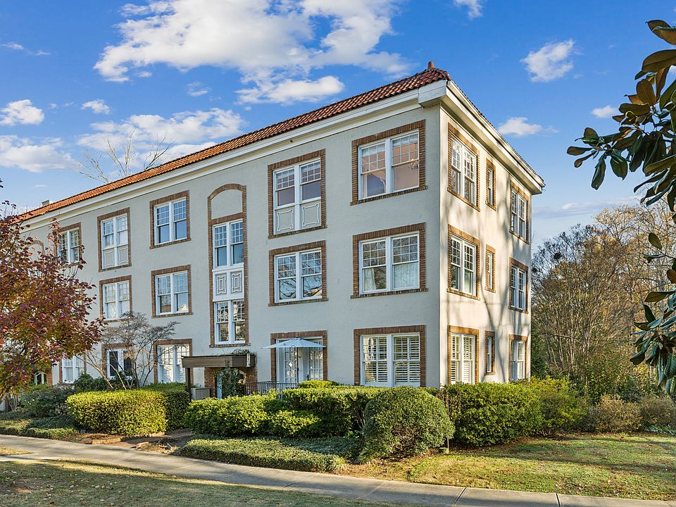 Exterior of The Grafton. Unit is top floor, right corner.