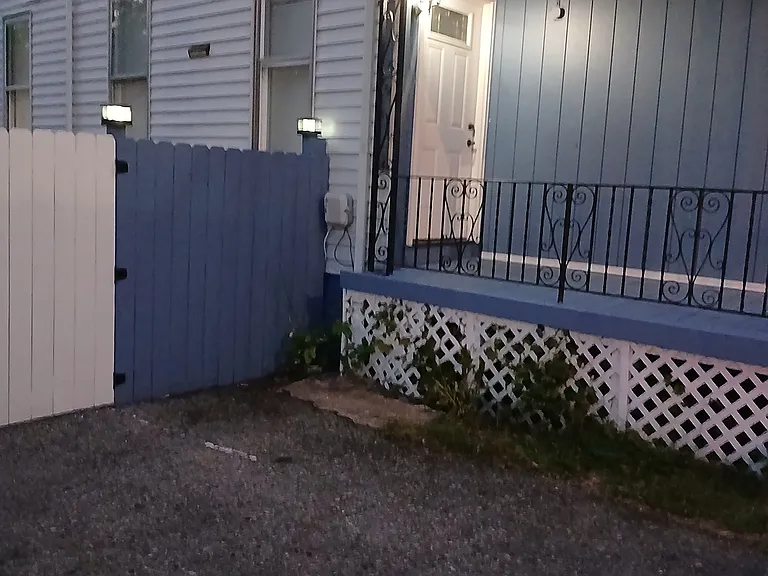 New front door, solar lights on the fence.