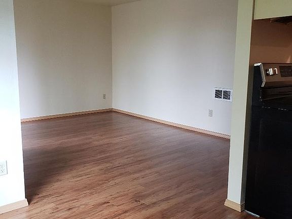 Hardwood floor in living room and kitchen