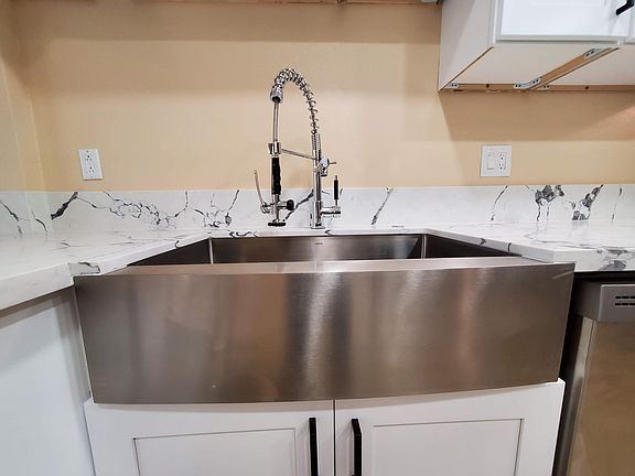 Brand new stainless steel farmhouse sink
