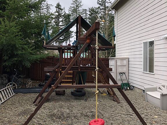 Rainbow play set can stay! Bus stop for Orting Schools is at