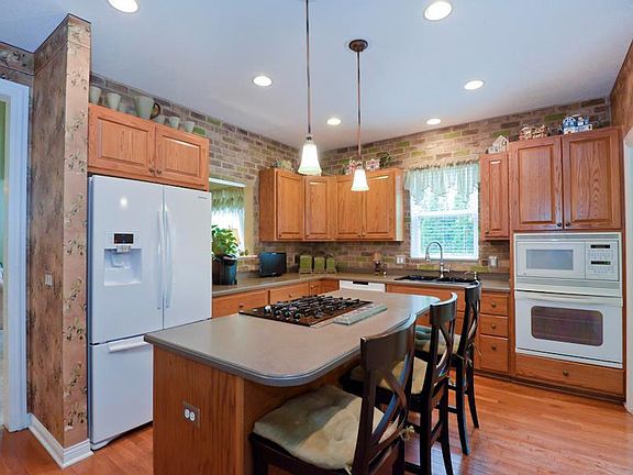 5th image of 4957 Golf Village Dr