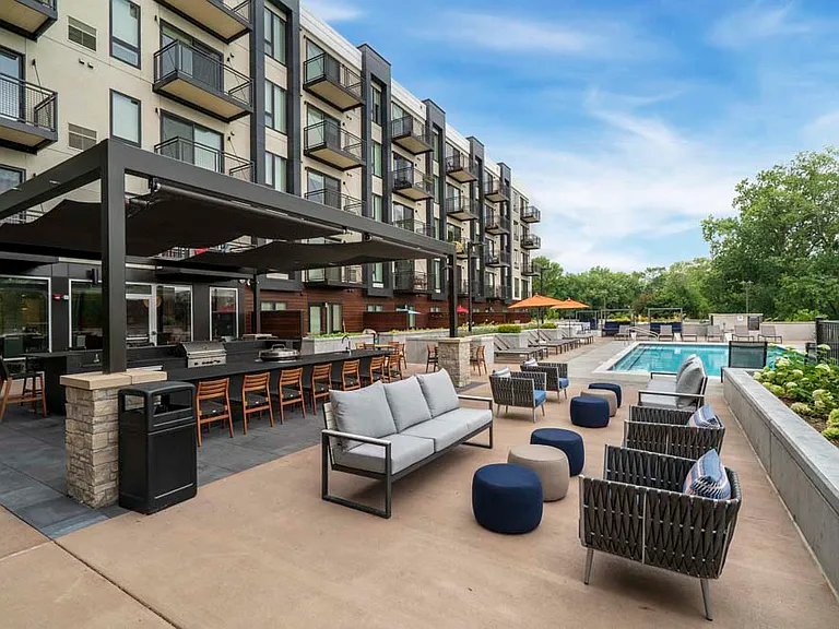 Outdoor lounge spaces offer a stylish place to unwind or gather with friends.