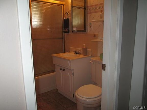 Full bath with nice Sliding glass door