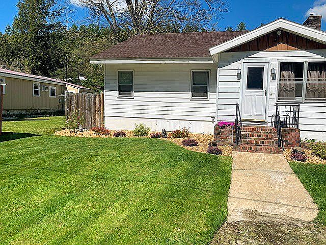 Front w/Beautiful Landscape