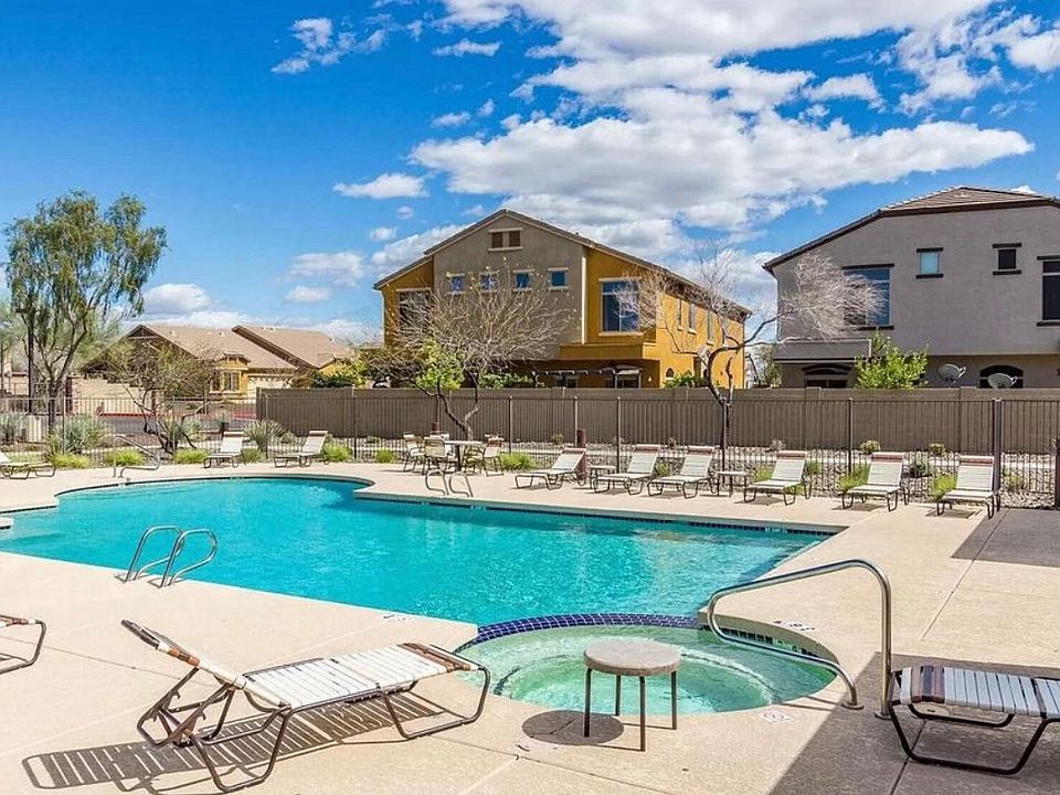 Community pool with heated jacuzzi.