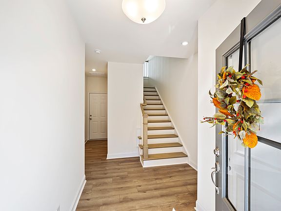 Beautiful entry with one bedroom or office on first level with full bath