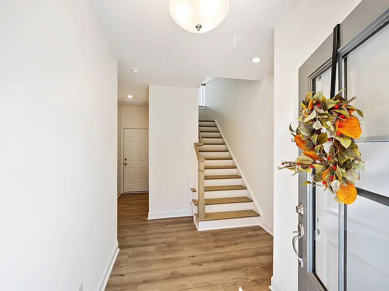 Beautiful entry with one bedroom or office on first level with full bath