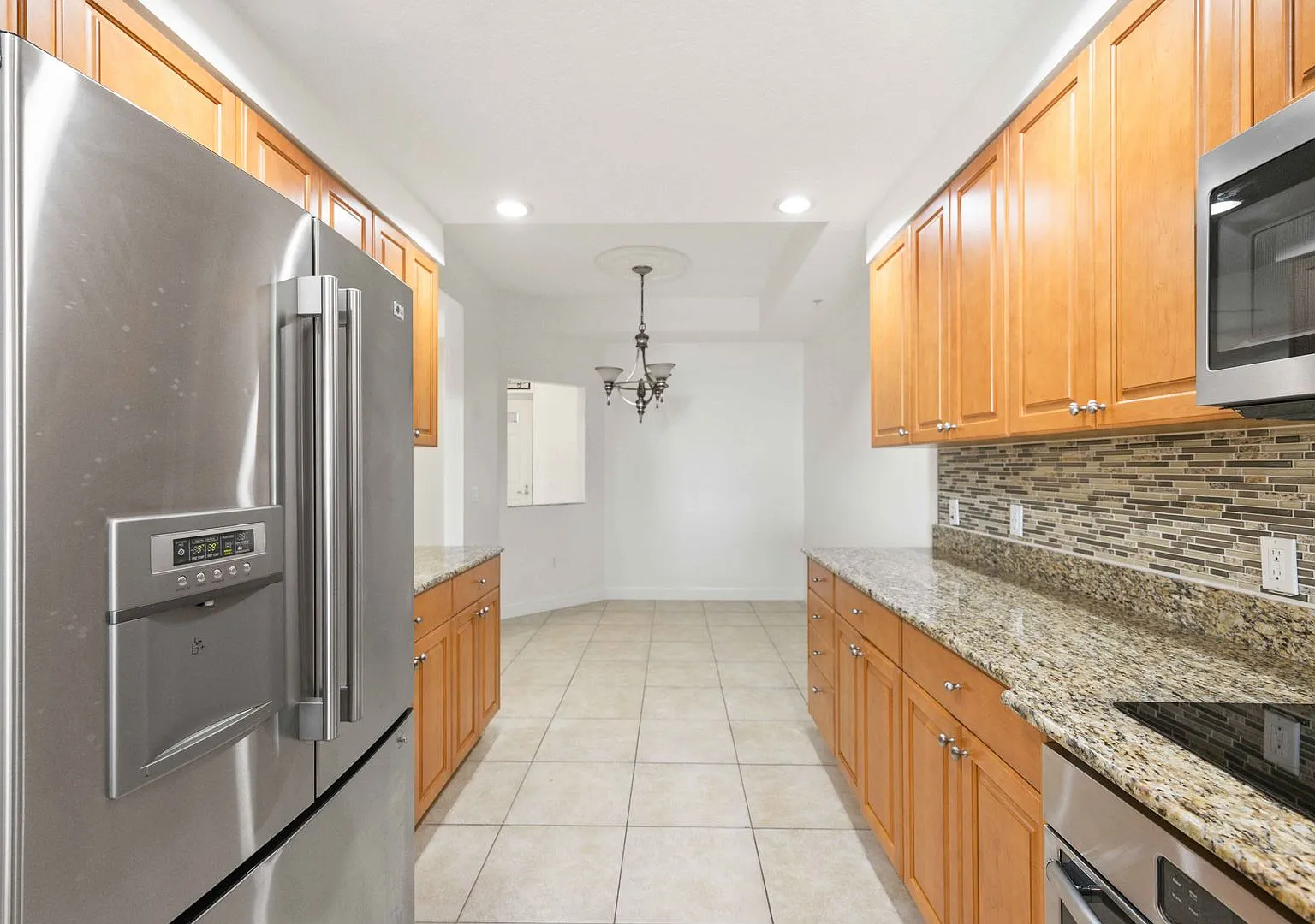 Gorgeous 2/2 + Den at Laguna in Riviera Dunes! — Photo 2