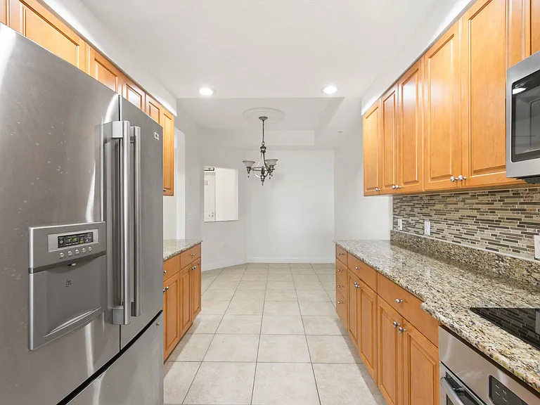 606 Riviera Dunes Way #302 — Photo 2