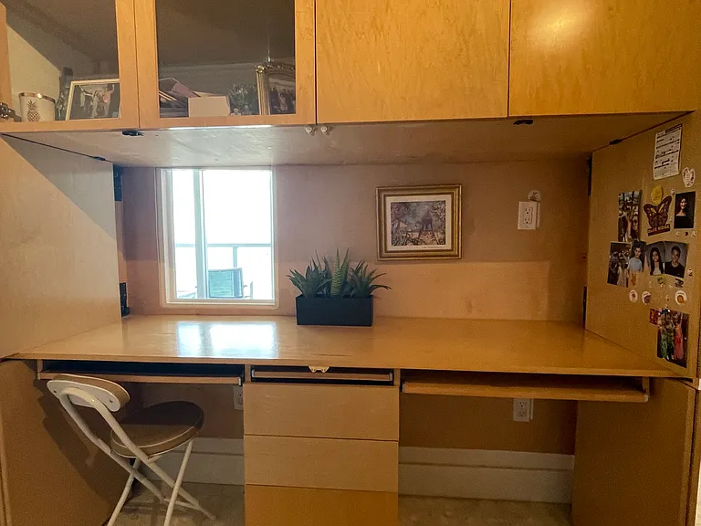 Double desk with ocean view.Lots of storage space