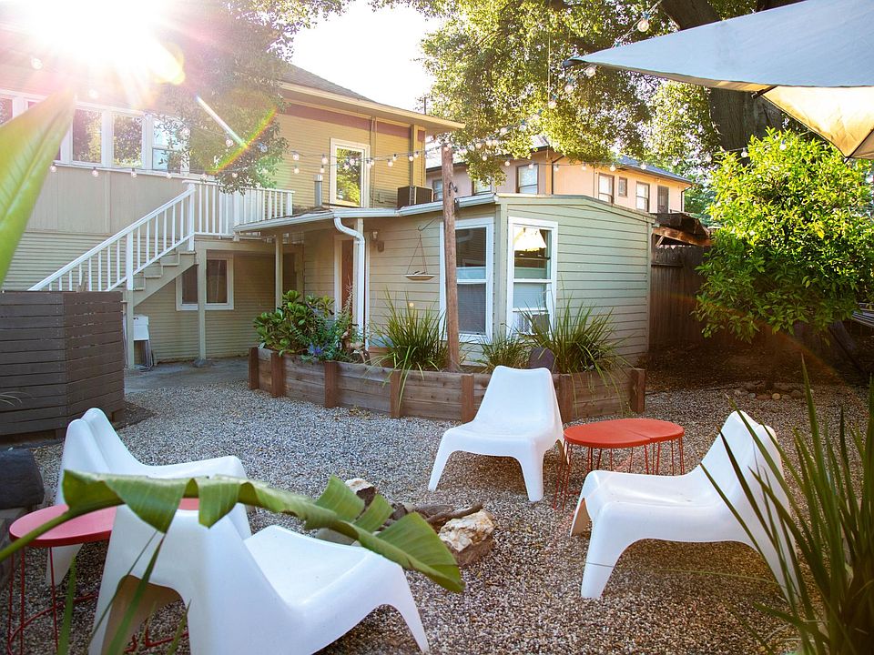 The cottage is located through the backyard