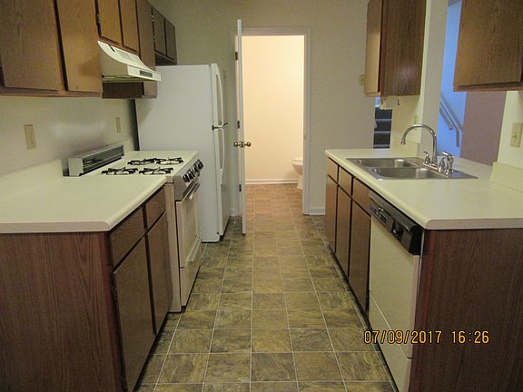 Kitchen w/a view to 1/2 bath