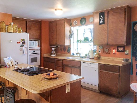 Kitchen opens to Living Room