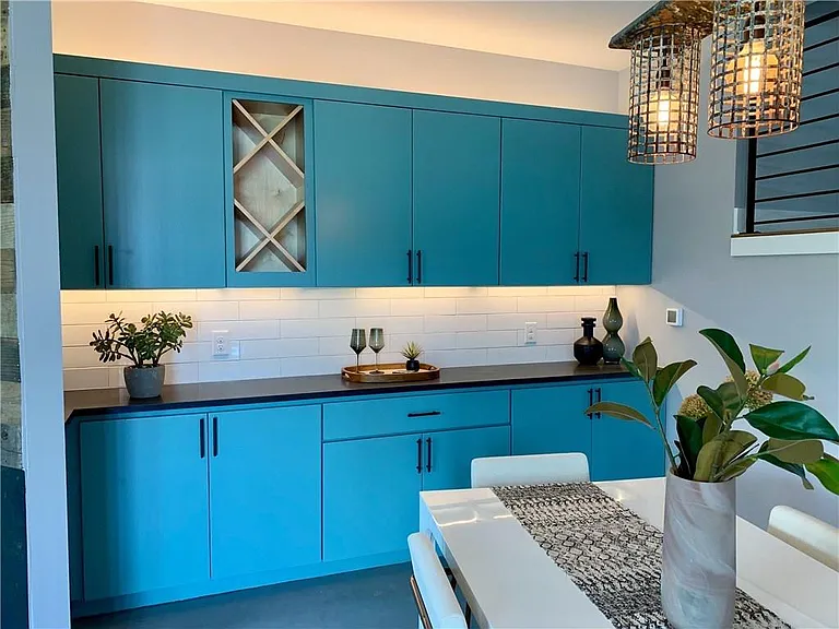 Luxurious dining room. Built-in Buffet cabinet with under and over cabinet light, And wine rack.