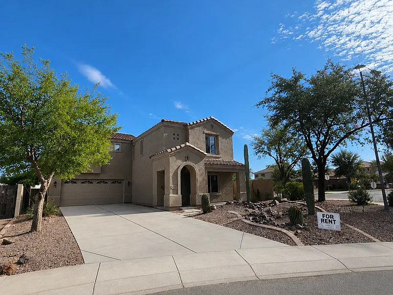 Extended driveway and 2 car garage.