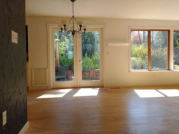 Den looking out to backyard patio