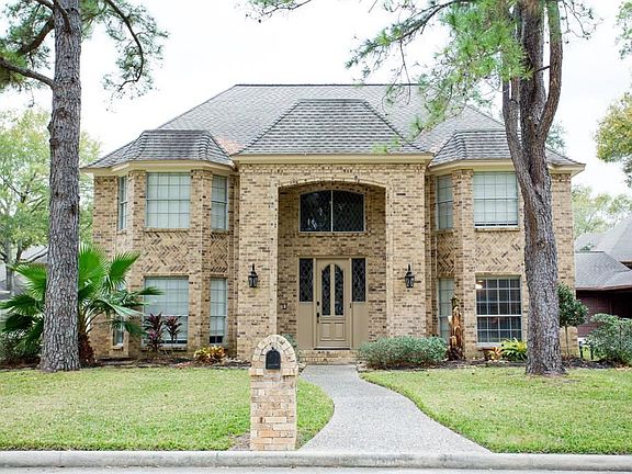 Stately home in the prestigious Champions Park neighborhood has lots of curb appeal! Front door faces south and home is nestled among two gorgeous mature trees. The home is a 4 bedroom 3/1 bath ready for you to put your finish touches.
