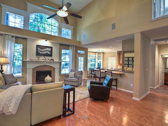 Isn't this beautiful! Hardwood floors, high volume ceilings, custom kitchen, decorator paint and lots of light!