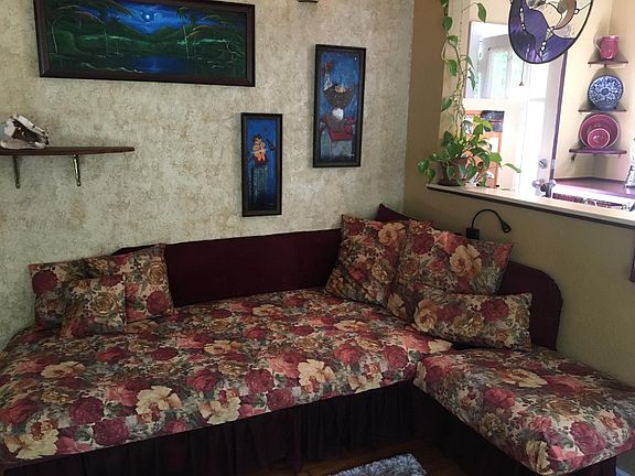 Living room futon couch (bed) and reading light