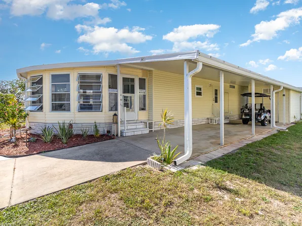 725 Oleander Cir, Barefoot Bay, FL 32976