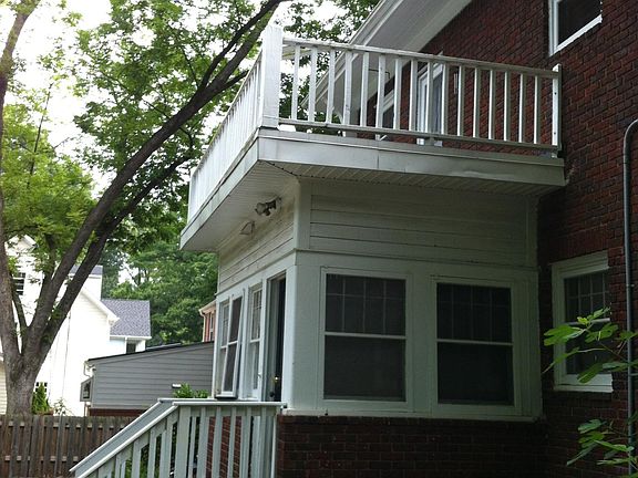 Sunroom under the upstairs porch