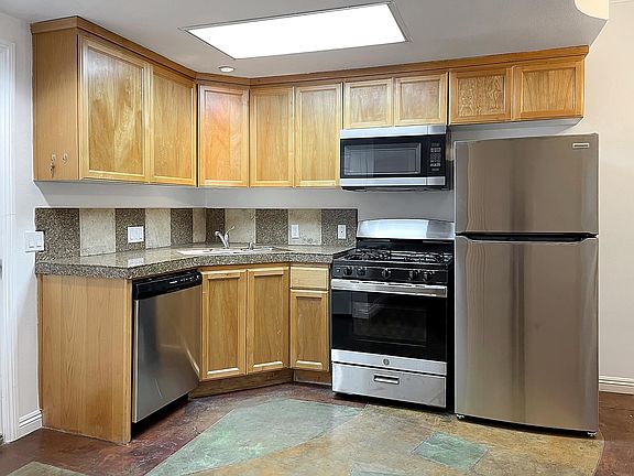Kitchen with Brand New Stainless-Steel Appliances