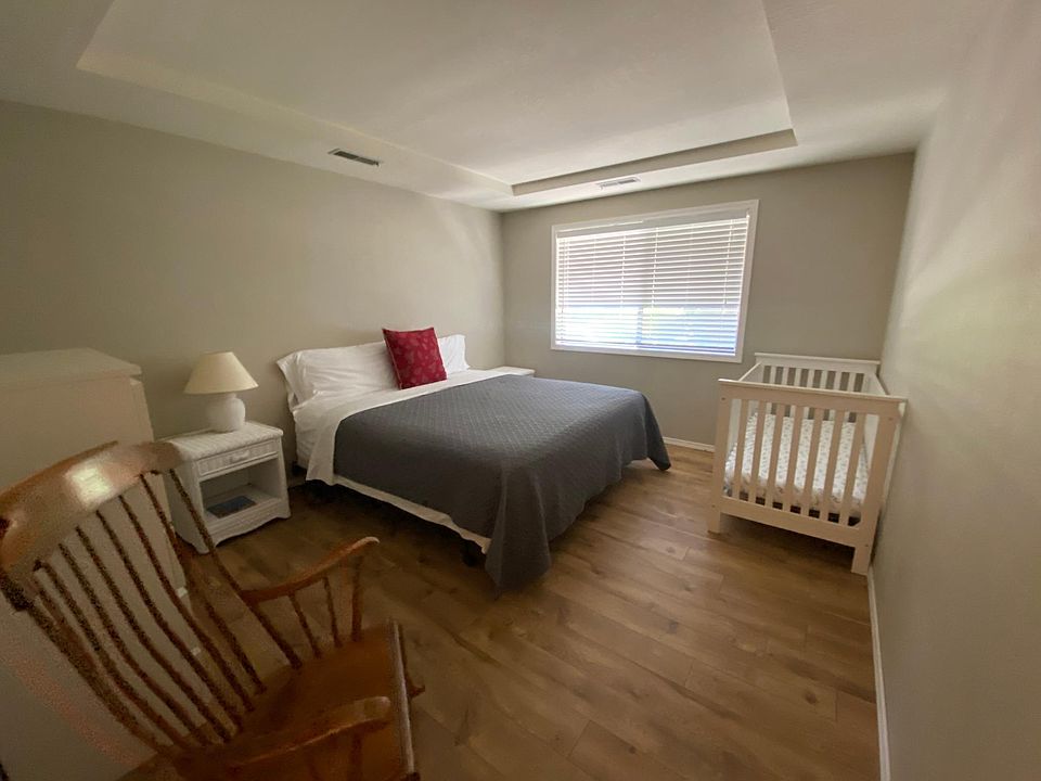 Master bedroom with built-in closets and additional drawers
