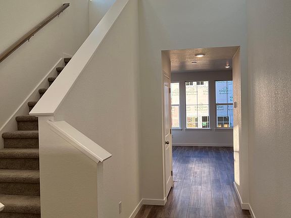 Entry way showing stairs to second floor.