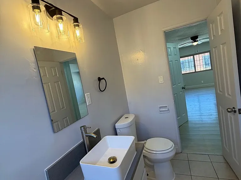 9619 S Hoover St — Photo 15